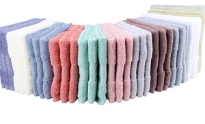 Soft cotton hand towels displayed in a colorful fan arrangement on a white background