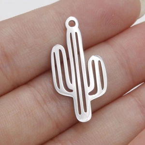 Polished stainless steel cactus pendant with hollow design held by fingers