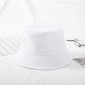 Close-up of white cotton bucket hat with parallel stitching on a minimalist background