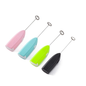 Mini electric milk frothers in pink, blue, green, and black with stainless steel heads