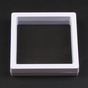 Close-up of square white 3D floating display frame with clear PE film for jewelry