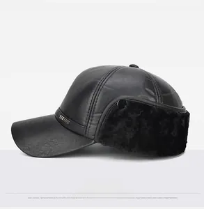 Detail view of winter leather baseball cap featuring foldable thick fleece earflaps and sports badge