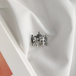 Detail of vintage 925 sterling silver cross ring featuring a gothic crucifix design