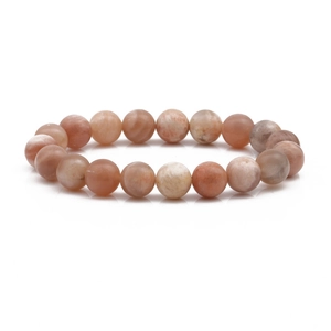 Detailed close-up of 10mm natural stone beads showing warm pink and tan mineral textures