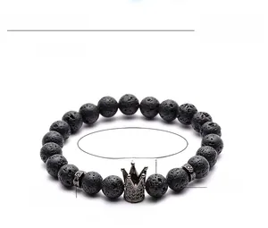 Detail view of 8mm lava stone bracelet showing copper crown and white zircon inlay specifications
