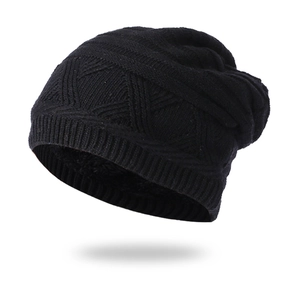 Warm black knitted winter beanie with thick fleece lining and geometric knit pattern
