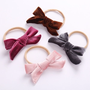 Set of 4 soft velvet bow nylon headbands for babies in brown, burgundy, grey, and pink