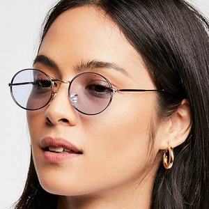 Retro small oval sunglasses with light purple lenses and gold metal frames for women