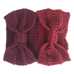 Detailed texture of thick knit bohemian headbands in deep purple and burgundy wine colors