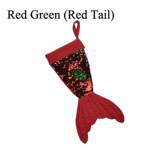 Christmas stocking with red and green reversible sequins in a mermaid tail design