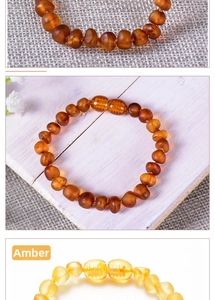 Detailed view of natural Baltic amber baby bracelets with golden and brown beads