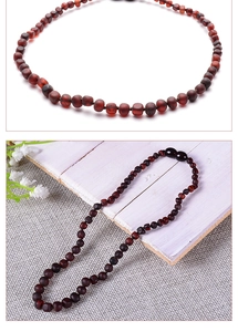 Detailed top and bottom views of natural Baltic cognac amber beaded necklace for babies