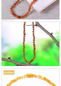 Macro detail of amber baby necklace beads with hidden safety screw clasp mechanism