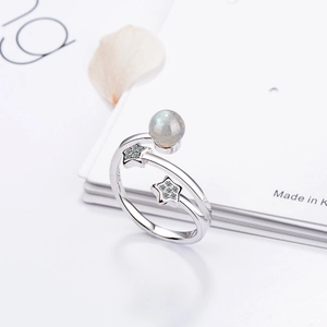 Star shaped S925 silver adjustable ring featuring a round moonstone and zircon stones