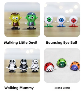 Detail of four Halloween clockwork toys including mummies, eyeballs and jumping monsters
