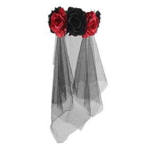 Detailed macro of vintage gothic headband featuring red and black roses with lace veil
