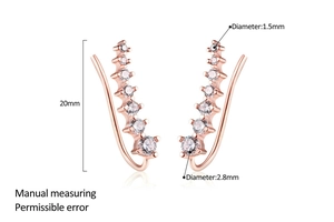 Detailed view of rose gold ear crawler with seven white zircons and 20mm dimensions