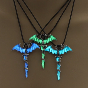 Luminous dragon wrapped around sword necklace set with glowing green and blue light effects