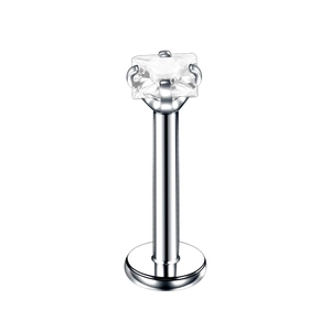 Macro shot of silver stainless steel labret stud with a square cubic zirconia stone