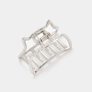 Detail of silver cat ear metal hair claw clip featuring polished finish and strong spring