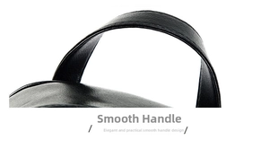 Detailed view of the rounded black leather handle with reinforced stitching on a large backpack