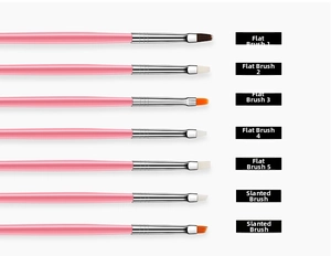 Detail view of 7 professional pink nail art brushes with various flat and slanted tips