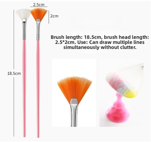 Detail of fan nail art brushes showing 18.5cm pink handle and 2.5cm width brush head