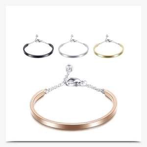 Detail view of U-shaped 4mm bracelets in four colors featuring lobster clasp and chain