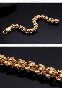 Macro close-up of golden punk skull bracelet links with polished metallic finish