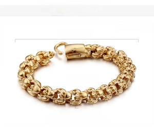 Detail view of 18K gold plated skull bracelet, 225mm length and 12mm width specifications