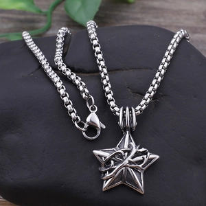 Vintage stainless steel star pendant with thorn texture on a silver venetian chain