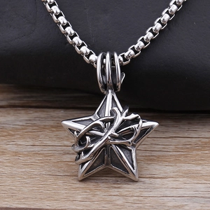 Retro stainless steel lucky star pendant necklace on a rustic wood and stone background