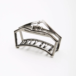 Minimalist silver geometric hollow hair claw clip with metallic finish for women