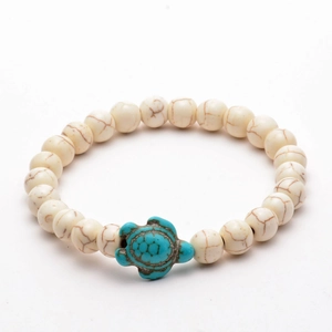 White turquoise beaded bracelet featuring a blue sea turtle pendant for couples