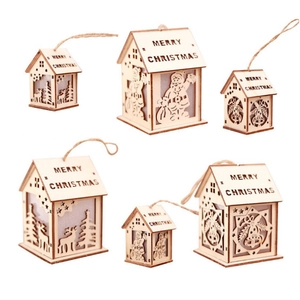 Set of six wooden Christmas house ornaments with laser-cut patterns and hanging ropes