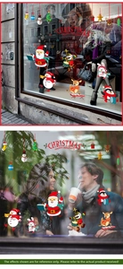 Détail des stickers de Noël avec orchestre de dessins animés sur une vitrine de café