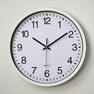 14 inch minimalist white round wall clock with black Arabic numerals and quartz movement