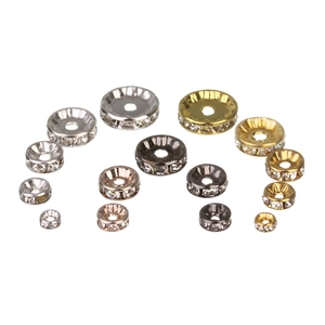 Detail of assorted DIY rhinestone spacer beads in gold, silver, rose gold and gunblack