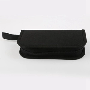 Close-up of a portable black fabric tool storage bag with zipper and carrying handle