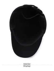 Detailed inner lining view of a black winter thermal cap with durable stitching