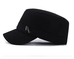 Detail view of black wool military cap featuring a silver metal N letter accent decoration