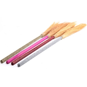 Halloween witch brooms with glitter handles in gold pink red and silver colors