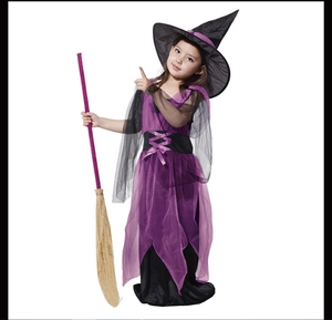 Detail view of purple and black mesh witch costume for kids with hat and broom props