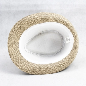 Detail view of khaki straw hat interior showing the size 57 label and sweatband