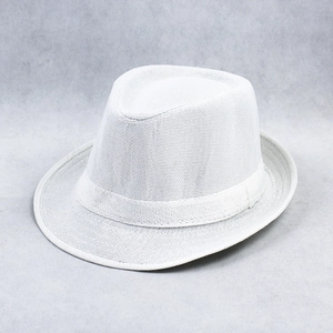 Close-up of finely woven white linen fedora hat with matching decorative ribbon band