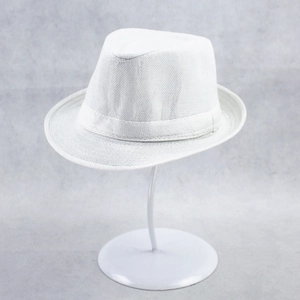 Detailed view of the classic white fedora hat crown and band on a display stand