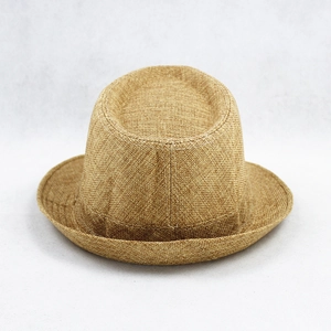 Close-up of the woven texture and top crease of this khaki straw fedora hat
