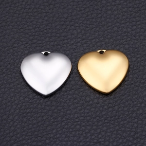 Polished stainless steel heart-shaped pendant charms in gold and silver finishes