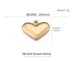 Macro detail of 18K gold vacuum plated heart pendant with 26x19mm size specifications