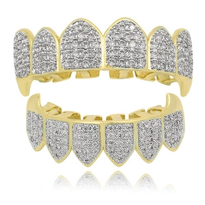 Detail of 18K gold plated hip hop grillz set fully encrusted with sparkling white zircons
